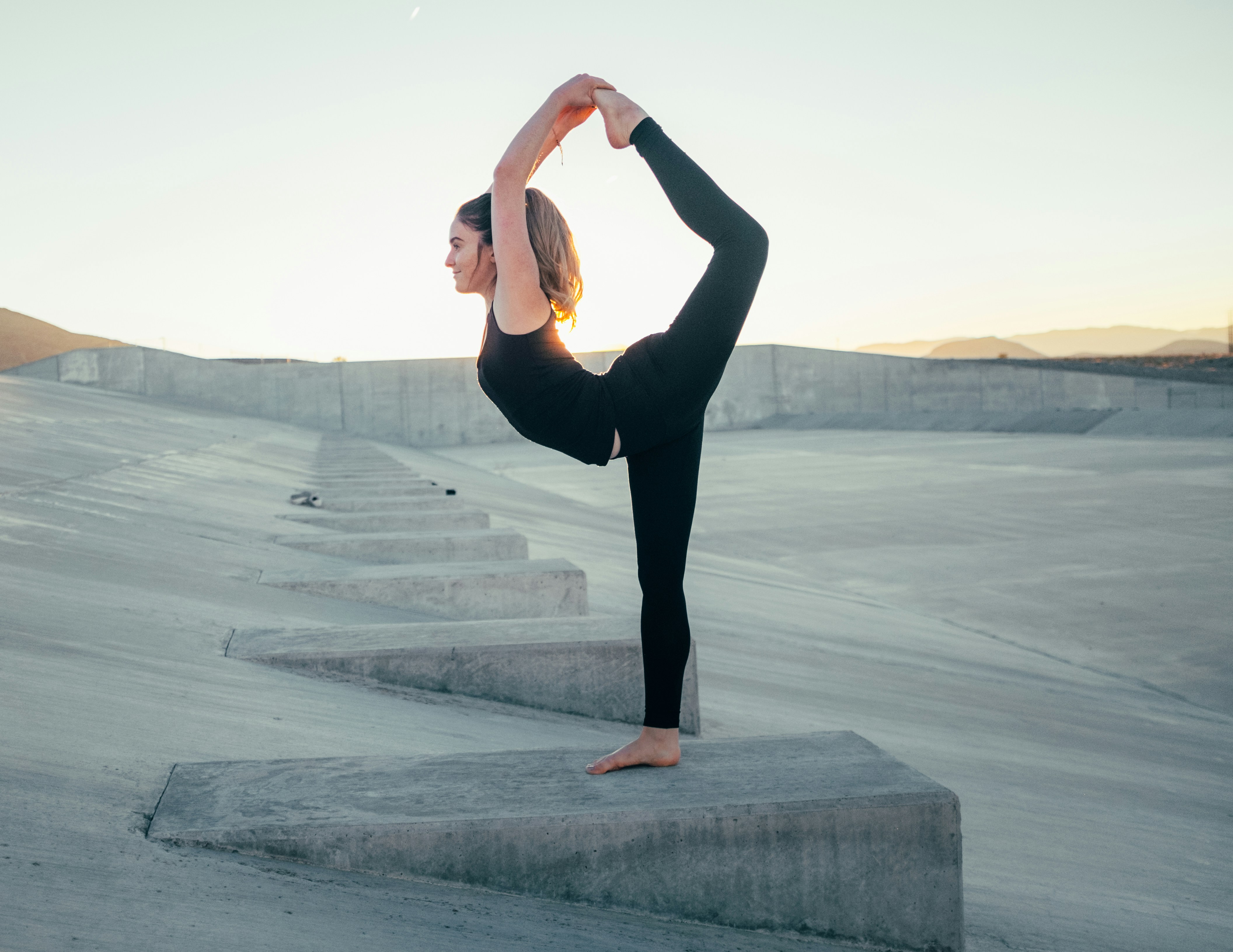 A woman Doing Stretching outside