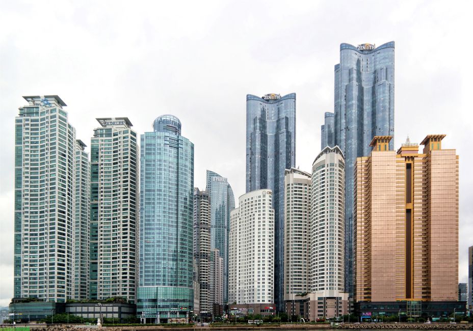 Panoramic view of impressive modern skyscrapers in a bustling urban cityscape.