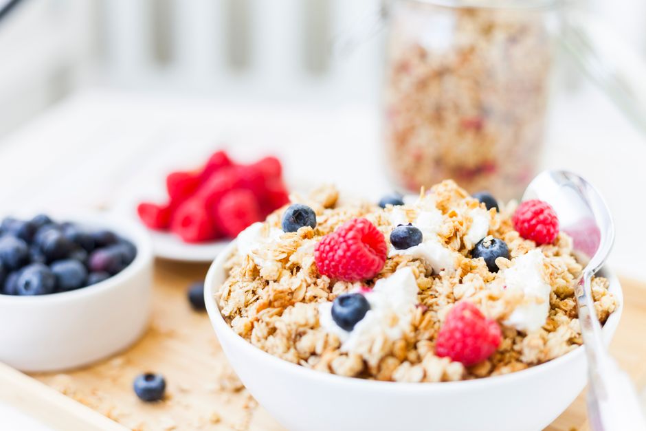 Health and fitness, What is the mistake!! Healthy granola breakfast bowl topped with fresh raspberries and blueberries.