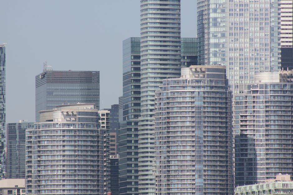 Panoramic view of modern skyscrapers showcasing urban architecture.