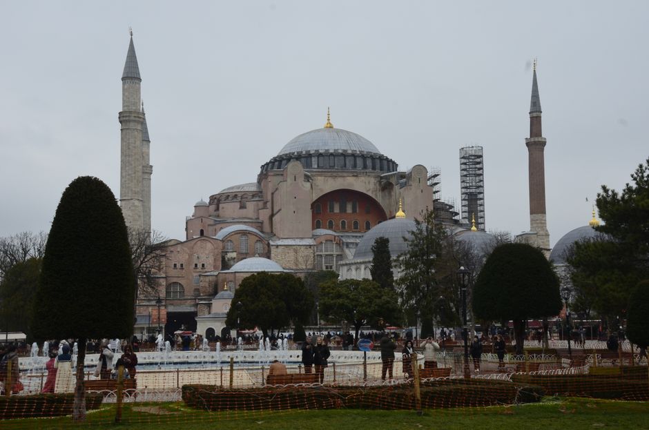 Discover the iconic Hagia Sophia in Istanbul with crowds in the foreground.